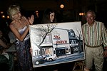 Highest Bidder Bill Dusenberry at JLXBistro for the &quotSave the Sign&quot benefit in Sag Harbor on 6-17-04. photo by Rob Rich copyright 2004<br>516-676-3939 robwayne1@aol.com<br>112 12th. AVe, Sea Cliff, N.Y.11579