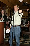 Auctioneer Roy Scheider at JLXBistro for the &quotSave the Sign&quot benefit in Sag Harbor on 6-17-04. photo by Rob Rich copyright 2004<br>516-676-3939 robwayne1@aol.com<br>112 12th. AVe, Sea Cliff, N.Y.11579