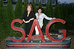 Jennifer Houser and Shiela Sculley at JLXBistro for the &quotSave the Sign&quot benefit in Sag Harbor on 6-17-04. photo by Rob Rich copyright 2004<br>516-676-3939 robwayne1@aol.com<br>112 12th. AVe, Sea Cliff, N.Y.11579