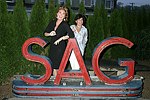 Jennifer Houser and Shiela Sculley at JLXBistro for the &quotSave the Sign&quot benefit in Sag Harbor on 6-17-04. photo by Rob Rich copyright 2004<br>516-676-3939 robwayne1@aol.com<br>112 12th. AVe, Sea Cliff, N.Y.11579