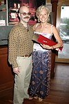 Sign maker Clayton Orehek and Brenda Siemer at JLXBistro for the &quotSave the Sign&quot benefit in Sag Harbor on 6-17-04. photo by Rob Rich copyright 2004<br>516-676-3939 robwayne1@aol.com<br>112 12th. AVe, Sea Cliff, N.Y.11579