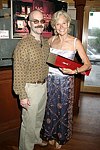 Sign maker Clayton Orehek and Brenda Siemer at JLXBistro for the &quotSave the Sign&quot benefit in Sag Harbor on 6-17-04. photo by Rob Rich copyright 2004<br>516-676-3939 robwayne1@aol.com<br>112 12th. AVe, Sea Cliff, N.Y.11579