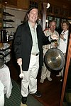 Manager Doug announcing dinner at JLXBistro for the &quotSave the Sign&quot benefit in Sag Harbor on 6-17-04. photo by Rob Rich copyright 2004<br>516-676-3939 robwayne1@aol.com<br>112 12th. AVe, Sea Cliff, N.Y.11579