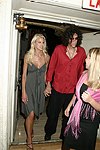NEW YORK - JUNE 15:Beth Ostrosky and Howard Stern  at the 80th.birthday celebration of famed restaruanteur GEORGE LANG at Cafe des Artistes<br>in Manhattan on June 15, 2004.<br>photo by Rob Rich copyright 2004 516-676-3939
