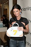 Nicky Hilton the launch of her handbag line on July 8, 2004  at Bloomingdale's Soho in Manhattan, N.Y. (Photo by Rob Rich/Everett Collection)
