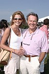 Jennifer Staggs and Jerry Ginsberg at the Mercedes Benz Polo Challenge on July 17, 2004 in Bridgehampton, N.Y.  photo by Rob Rich copyright 2004<br>516-676-3939 robwayne1@aol.com