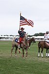 Erin O'Brien proudly displays the flag  at the Mercedes Benz Polo Challenge on 7-24-04 in Bridgehamton, N.Y.  photo by Rob Rich copyright 2004<br>516-676-3939  robwayne1@aol.com