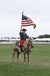 Erin O'Brien proudly displays the flag  at the Mercedes Benz Polo Challenge on 7-24-04 in Bridgehamton, N.Y.  photo by Rob Rich copyright 2004<br>516-676-3939  robwayne1@aol.com