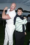 Jason Binn and Mr. Clean at the Mercedes Benz Polo Challenge on 8-21-04.  <br>photo by Rob Rich copyright 2004 516-676-3939  robwayne1@aol.com