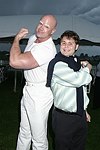 Jason Binn and Mr. Clean at the Mercedes Benz Polo Challenge on 8-21-04.  <br>photo by Rob Rich copyright 2004 516-676-3939  robwayne1@aol.com
