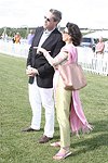 Jim Taylor and Pamela Fiore from Town and Country Magazine  at the Mercedes Benz Polo Challenge on Bridgehamtpon, N.Y. on 8-7-04.<br>photo by Rob Rich copyright 2004<br>516-676-3939<br>robwayne1@aol.com