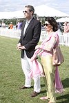 Jim Taylor and Pamela Fiore from Town and Country Magazine  at the Mercedes Benz Polo Challenge on Bridgehamtpon, N.Y. on 8-7-04.<br>photo by Rob Rich copyright 2004<br>516-676-3939<br>robwayne1@aol.com