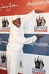 Russell Simmons at the Sean P. Diddy Coombs  annual White Party on July 4, 2004at the Sony Playstation 2 Estate in Bridgehampton, N.Y.  (Photo by Rob Rich/Everett Collection)