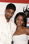 Farnsworth Bentley and guest at the Sean P. Diddy Coombs  annual White Party on July 4, 2004at the Sony Playstation 2 Estate in Bridgehampton, N.Y.  (Photo by Rob Rich/Everett Collection)