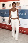 Managing Editor of Teen People Amy Barnett at the Sean P. Diddy Coombs  annual White Party on July 4, 2004at the Sony Playstation 2 Estate in Bridgehampton, N.Y.  (Photo by Rob Rich/Everett Collection)
