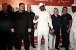Sean Coombs with the Declaration of Independence and security guards at the Sean P. Diddy Coombs  annual White Party on July 4, 2004at the Sony Playstation 2 Estate in Bridgehampton, N.Y.  (Photo by Rob Rich/Everett Collection)