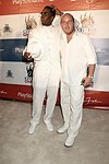 Sean Coombs and Noah Teppenberg at the Sean P. Diddy Coombs  annual White Party on July 4, 2004at the Sony Playstation 2 Estate in Bridgehampton, N.Y.  (Photo by Rob Rich/Everett Collection)