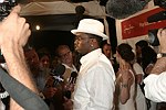 Sean Coombs being interviewed at the Sean P. Diddy Coombs  annual White Party on July 4, 2004at the Sony Playstation 2 Estate in Bridgehampton, N.Y.  (Photo by Rob Rich/Everett Collection)