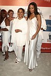 Phylicia Rashad and  Sanaa Lathan at the Sean P. Diddy Coombs  annual White Party on July 4, 2004at the Sony Playstation 2 Estate in Bridgehampton, N.Y.  (Photo by Rob Rich/Everett Collection)
