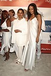 Janice Coombs, Phylicia Rashad, and Sanaa Lathan at the Sean P. Diddy Coombs  annual White Party on July 4, 2004at the Sony Playstation 2 Estate in Bridgehampton, N.Y.  (Photo by Rob Rich/Everett Collection)