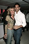  Kadrina Bouzalas and Kelps Suchelev at the Michael Dweck book party at Resort on 6-19-04<br>photo by Rob Rich copyright 2004  516-676-3939<br>robwayne1@aol.com  112 12th. Ave, Sea Cliff, N.Y. 11579
