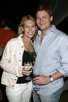 Michelle Gut and Josh Lobel  at the after party for the movie premiere of 'RIDING GIANTS' at the Southampton home of Andrew Rosen on 7-2-04<br>photo by Rob Rich copyright 2004  516-676-3939
