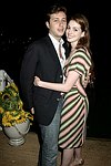 Raffaello Folliere and Ann Hathaway at the after party for the movie premiere of 'RIDING GIANTS' at the Southampton home of Andrew Rosen on 7-2-04<br>photo by Rob Rich copyright 2004  516-676-3939