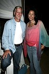 Rick Hartmann and Kim Heirston at the after party for the movie premiere of 'RIDING GIANTS' at the Southampton home of Andrew Rosen on 7-2-04<br>photo by Rob Rich copyright 2004  516-676-3939