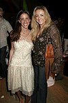 Dori Cooperman and Caroline Berthet at the after party for the movie premiere of 'RIDING GIANTS' at the Southampton home of Andrew Rosen on 7-2-04<br>photo by Rob Rich copyright 2004  516-676-3939