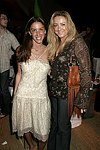 Dori Cooperman and Caroline Berthet  at the after party for the movie premiere of 'RIDING GIANTS' at the Southampton home of Andrew Rosen on 7-2-04<br>photo by Rob Rich copyright 2004  516-676-3939