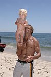 Reece Viola Hamilton with surfer dad Laird Hamilton<br> at the 'Riding Giants' beach party at the Watermill ocean front residence of Alex von Furstenberg on 7-3-04<br>photos by Rob Rich copyright 2004  516-676-3939