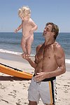 Reece Viola Hamilton with surfer dad Laird Hamilton<br> at the 'Riding Giants' beach party at the Watermill ocean front residence of Alex von Furstenberg on 7-3-04<br>photos by Rob Rich copyright 2004  516-676-3939