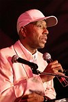  Russell Simmons at the Rush Philanthropic Arts Foundation 5th. Annual Hamptons Benefit at the Easthampton residence of Russell and Kimora Lee Simmons  on July 24, 2004 in Easthampton, N.Y.   (Photo by Rob Rich/Everett Collection)