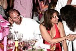 Jason Cippola and Lorraine Bracco  at the Rush Philanthropic Arts Foundation 5th. Annual Hamptons Benefit at the Easthampton residence of Russell and Kimora Lee Simmons  on July 24, 2004 in Easthampton, N.Y.   (Photo by Rob Rich/Everett Collection)