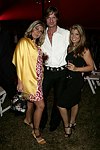 Ron Curtis and guests  at the Southhampton Hospital Benefit in Southampton, N.Y. on August 7, 2004.photo by Rob Rich copyright 2004<br>516-676-3939<br>robwayne1@aol.com